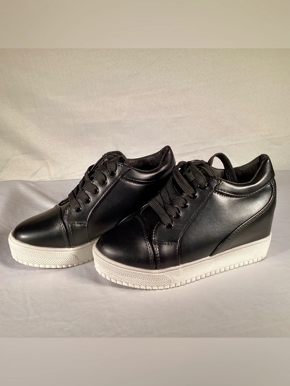 Women’s Black wedge sneakers with hidden heel ankle high platforms